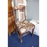 A CAROLEAN STYLE CHAIR, with spiral twist legs and back and needlework seat and back rail