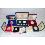 A COLLECTION OF COINS in fitted presentation cases, to include 'Franklin Mint' British Virgin