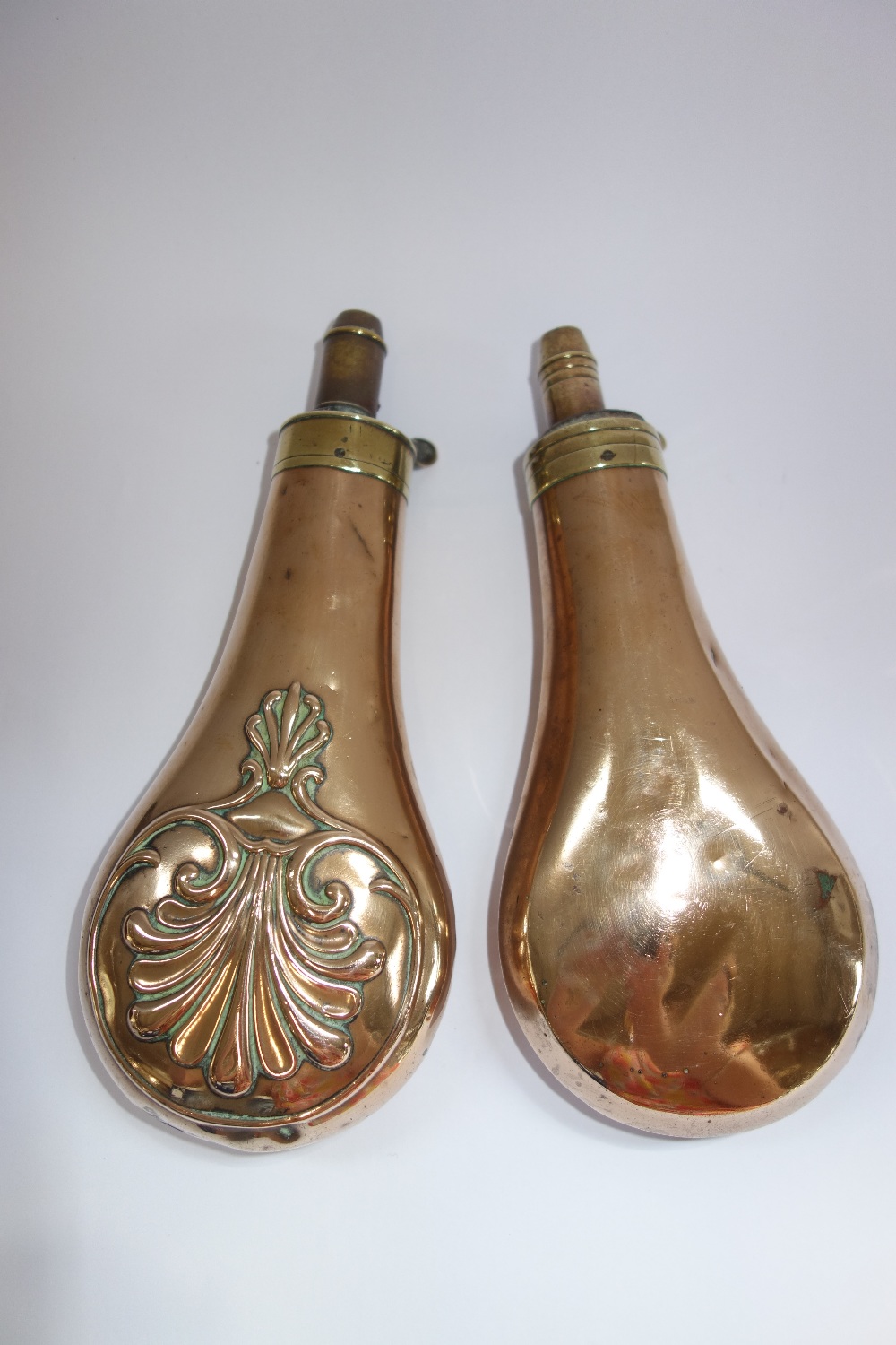 TWO COPPER AND BRASS POWDER FLASKS