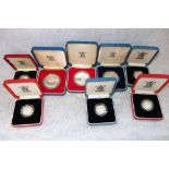 A COLLECTION OF COINS in fitted presentation cases, to include a Royal Mint silver coin