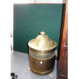 A BRASS COAL BUCKET with paw feet and a folding card table