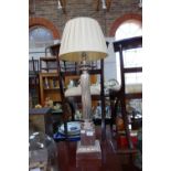 A LARGE SILVER PLATED TABLE LAMP, with a reeded column on a square plinth, 56 cm high (plus