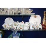 A COLLECTION OF CRESTED CHINA to include a Shelley fishing creel