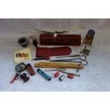 A VICTORIAN GLASS PAPERWEIGHT, pens, pencils and writing sundries