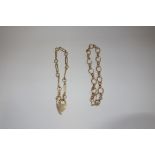 A 9 CT YELLOW GOLD CHAIN LINK BRACELET, and one other similar (2)