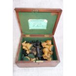 A CHESS SET, in a wooden box inscribed 'The Staunton Chess-Men, entered number 1441, signed H