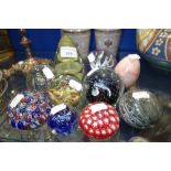 A COLLECTION OF GLASS PAPERWEIGHTS to include millefiore