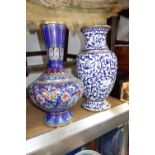 A LARGE BLUE GROUND CLOISONNE VASE, 40 cm high and another in blue and white, 39 cm high