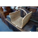 A WICKER LOG CARRIER and a small stool