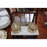 A PAIR OF 19TH CENTURY SCALES with a white marble top and shaped horn bowls and an Edwardian oak