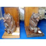 A PAIR OF CARVED "BLACK FOREST" BEAR BOOKENDS