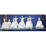 A COLLECTION OF WHITE GLAZED "MOROCCAN" FIGURES, seated and dancing