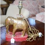 AN ASIAN GILTWOOD ELEPHANT TABLE LAMP, 24.5cm high (plus fitting)