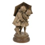 AFTER GUSTAV VAN VAERNBERGH (1873-1927) A PLASTER SCULPTURE modelled as two children under an