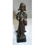 A BRONZE STUDY OF A DUTCH GIRL, signed "J. Pilar" 13cm high