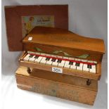 A "KING PIANO" TOY PIANO in wood made in Japan, circa 1920's, 32 cm wide