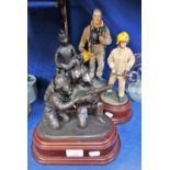 A COLLECTION OF RESIN FIGURES OF FIREMEN (4)