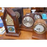 A COLLECTION OF CLOCKS, including two oak cased Napoleon hat examples