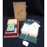 A 1920'S "POKER-PATIENCE" SET in a fitted leather box, a similar "Bridge" set and paying cards
