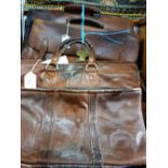 THREE BROWN LEATHER VINTAGE SUITCASES