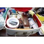 A VINTAGE SUITCASE CONTAINING, clothes brushes, sunglasses, perfume and other vintage ephemera