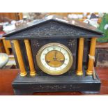 A 19TH CENTURY SLATE CASED MANTEL CLOCK of architectural form