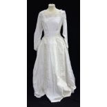 LEE DELMAN: A VINTAGE CREAM WEDDING DRESS, with applied embroidered detail