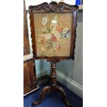 A VICTORIAN ROSEWOOD POLE SCREEN with foliate needlework panel, 44cm wide