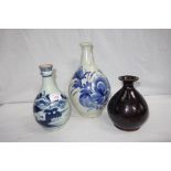 A CHINESE KANGXI STYLE BOTTLE VASE, with hand painted decoration and two Japanese bottle vases (3)