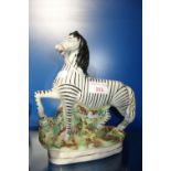 A STAFFORDSHIRE ZEBRA, 22 cm high