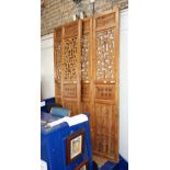 A SET OF FOUR CHINESE ARCHITECTURAL PINE PANELS, late Quing Republic, each panel 226 cm high x 50 cm