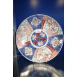 JAPANESE IMARI DISH decorated with floral segmented panels, 30.5cm