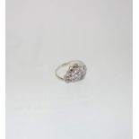 A CLEAR PASTE CLUSTER DRESS RING on a white gold shank stamped 750, size N