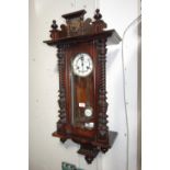 A 19TH CENTURY WALNUT CASED WALL CLOCK