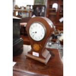 AN EDWARDIAN MAHOGANY BALLOON CLOCK with an enamel face, 24 cm high