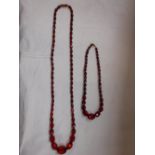 TWO GRADUATED GLASS BEAD NECKLACES