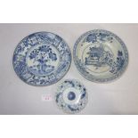 A CHINESE " KRAAK" TYPE BLUE AND WHITE DISH, decorated with trees and trailing blossoms in segmented