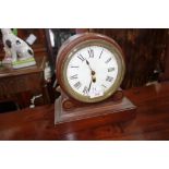 A 19TH CENTURY OAK CASED MANTEL CLOCK with a white enamel circular dial, 27.5 cm high