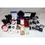 A BOX OF MIXED SILVER AND WHITE METAL COSTUME JEWELLERY