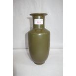 A CHINESE GREEN MATT "TEA DUST" GLAZE VASE, cylindrical everted collar, impressed seal mark, 24cm