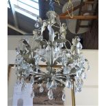 A CREAM PAINTED CONTEMPORARY CHANDELIER with leaf work branches and glass lustre