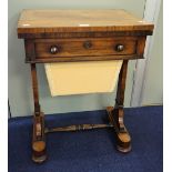 A REGENCY ROSEWOOD WORKTABLE fitted a drawer and sliding basket and fold-over to