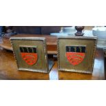 A PAIR OF ROWLEY GALLERY GILT BOOKENDS, the centres each painted with a shield,