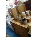 AN EDWARDIAN STRIPPED PINE DRESSING CHEST with oval mirror and a small stripped