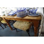 A VICTORIAN STYLE PINE KITCHEN TABLE with turned legs, 120cm x 68cm