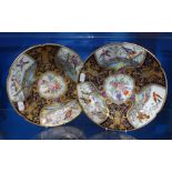 A PAIR OF 19TH CENTURY CONTINENTAL CABINET PLATES with Royal blue and gilt decor