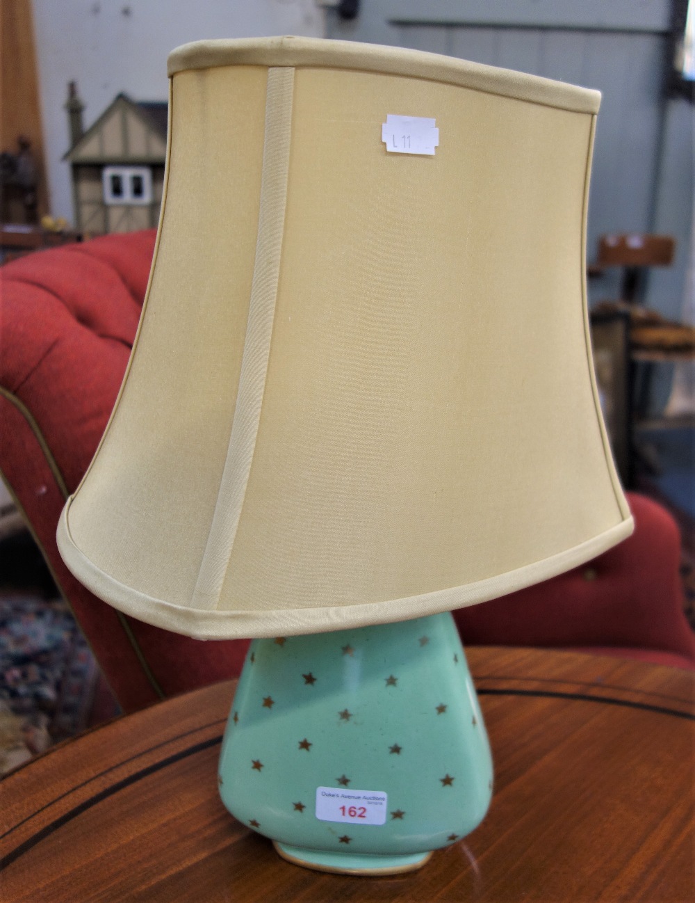 A 1950S/60S PRIMAVERA VINTAGE GREEN CERAMIC TABLE LAMP with gold star decoration