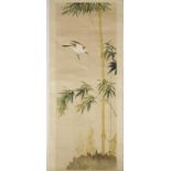 A CHINESE SILK PAINTING of a bird flying towards bamboo shoots with leaves, on a