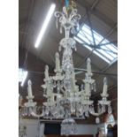 A LARGE FOURTEEN BRANCH GLASS CHANDELIER with glass drop lustres with chrome pla