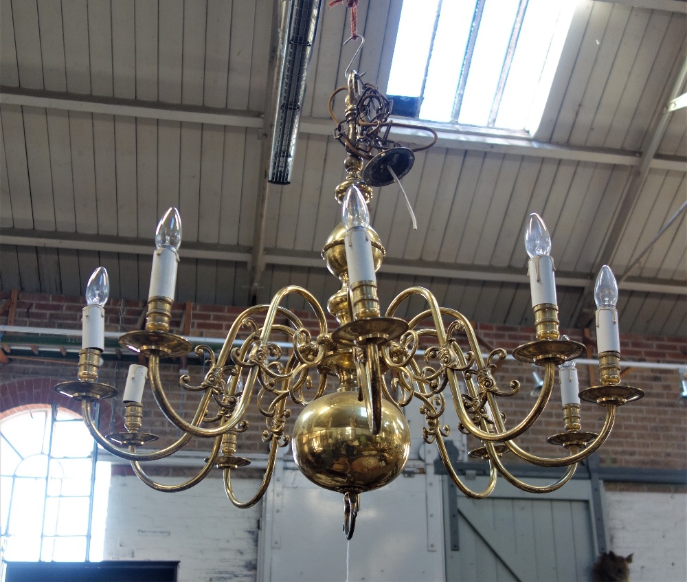 A LARGE 'DUTCH' BRASS CHANDELIER, with ten scrolled branches